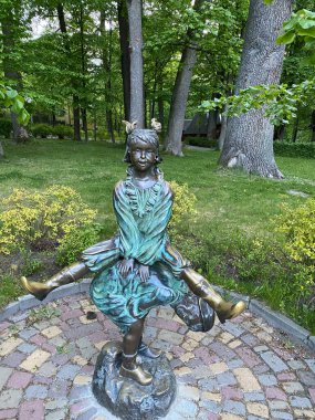 The copper monument in Buchi city park Kiev region spring 2022 was punched by Russian fragments after shelling