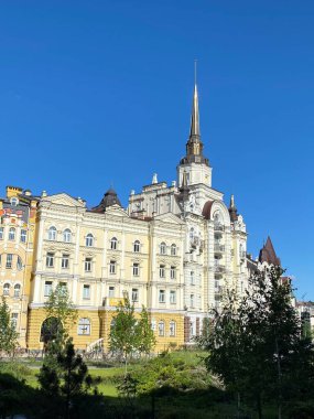 Beautiful old building with a spire against the blue sky Kiev Ukraine