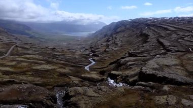 Iceland Berufjordur Waterfall at oxi road eastern of Iceland, a birds-eye view. High quality 4k footage