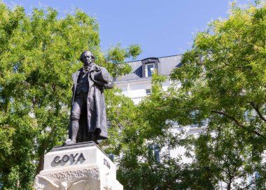 Madrid, Spain - August 14, 2022: Statue of Francisco Goya, a famous Spanish painter, outside of the Prado Museum in Madrid, Spain.