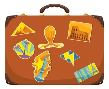 Üzerinde çıkartmalar olan kahverengi renkli deri valiz..