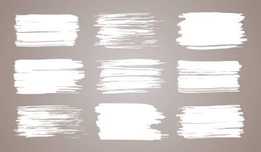 Boya fırçası seti. Beyaz mürekkep grunge fırça darbeleri. Grunge tasarım elementleri. Boyalı mürekkep çizgileri. Yaratıcı izole yerler. Mürekkep lekesi, soyut şekil lekeleri ve karalama seti.