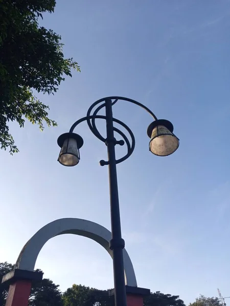 antique garden lamp under the blue sky