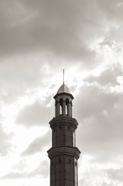 Beautiful isolated black and white mosque tower