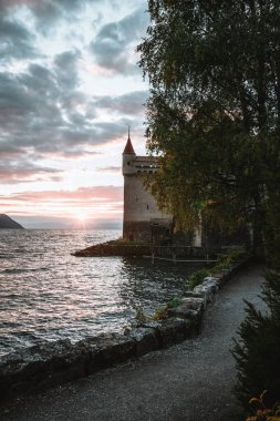 Chillon Castle on Lake Geneva during sunset