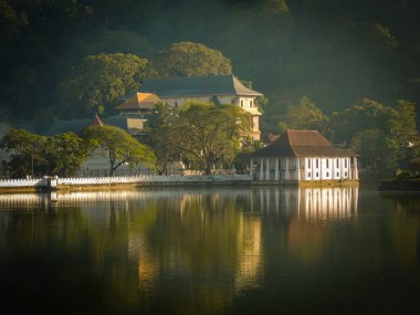 The Kandy Dalada Palace, also known as the Temple of the Tooth, is a sacred Buddhist temple located in the city of Kandy, Sri Lanka