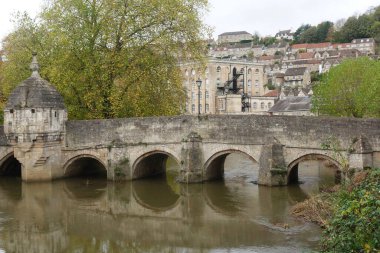 Scenic view of the River Avon running under the old town Bridge in the beautiful town of Bradford on Avon near the city of Bath in England - the historic town is a popular travel destination