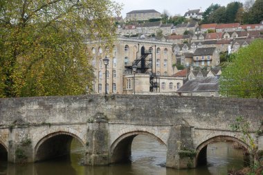 Scenic view of the River Avon running under the old town Bridge in the beautiful town of Bradford on Avon near the city of Bath in England - the historic town is a popular travel destination