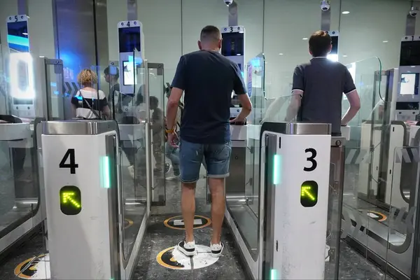 stock image Air travellers pass through automated passport border control e-gates at Heathrow Airport on August 2, 2024 in London, UK. 