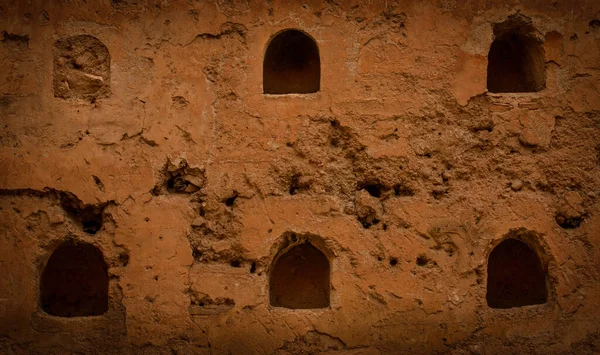 The rocky made architecture of Marrakech, Morocco is a testament to the city's rich cultural heritage and artistic excellence. Its rough exterior, carved from the earth, is a beautiful contrast to the intricate design and ornate details.