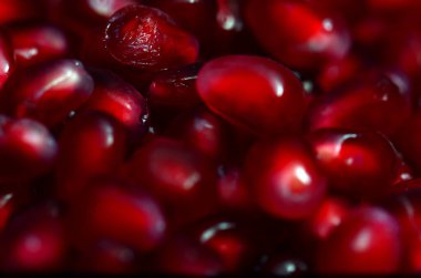A macro shot of Pomegranate seeds with a special macro lens and flash. clipart