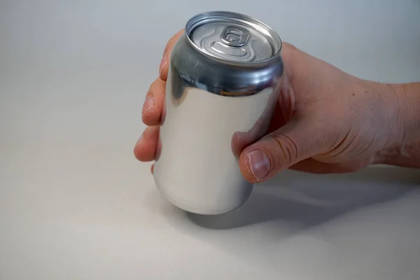 Hand Holding Grey Tin Can White Background — Stock Photo, Image