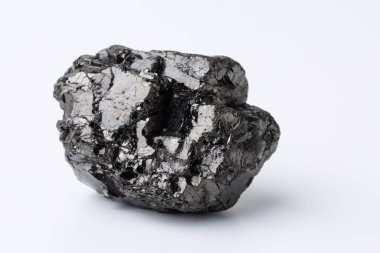 Natural black fossil coal on a white isolated background.