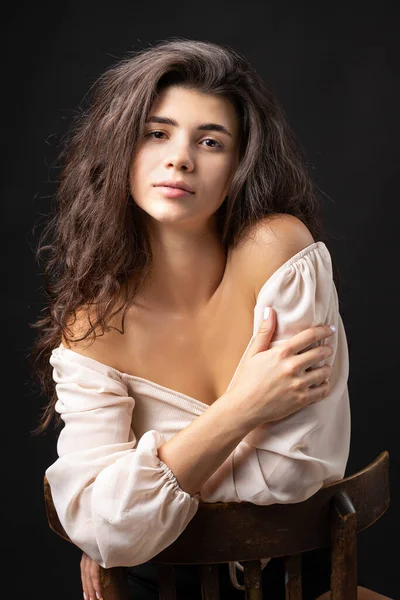 Classic Studio Portrait Young Brunette White Loose Top Who Sitting — Stockfoto