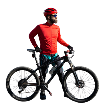 Cyclist riding bicycle on road against clear sky. A man in an outfit stands with a bicycle on an autumn sunny day.