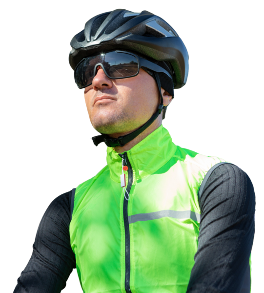 A man in clothes stands with a bicycle on an autumn sunny day. Cyclist in an urban environment.