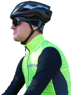 A man in clothes stands with a bicycle on an autumn sunny day. Cyclist in an urban environment.