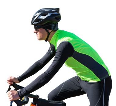 Cyclist riding bicycle on offroad against clear sky. A man in an outfit stands with a bicycle on an autumn sunny day.