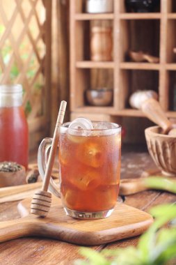 honey and cinnamon sticks. selective focus. space for text.