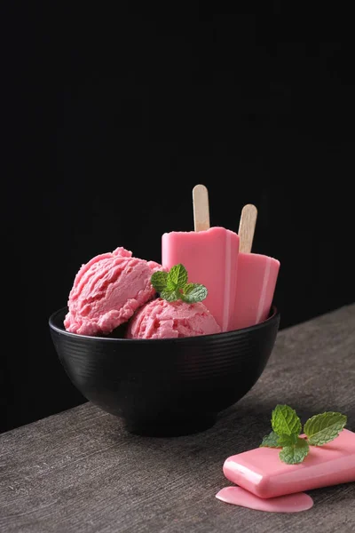 Strawberry flavored ice cream with black background