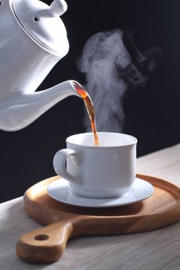 Coffee is a drink prepared from roasted coffee beans. Darkly colored, bitter, and slightly acidic, coffee has a stimulating effect on humans, primarily due to its caffeine content. It has the highest sales in the world market for hot drinks.