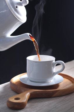 Coffee is a drink prepared from roasted coffee beans. Darkly colored, bitter, and slightly acidic, coffee has a stimulating effect on humans, primarily due to its caffeine content. It has the highest sales in the world market for hot drinks.