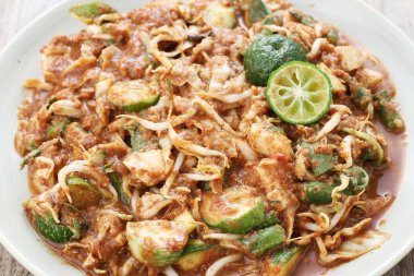 Karedok is a raw vegetable salad in peanut sauce from Sundanese region, West Java, Indonesia. It is one of the Sundanese signature dish.