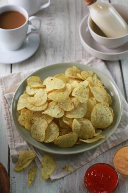 potato chip on a bright background