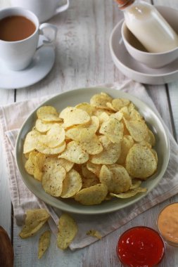 potato chip on a bright background
