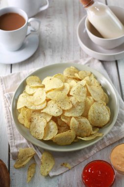 potato chip on a bright background