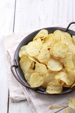 potato chip on a bright background