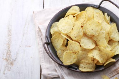 potato chip on a bright background
