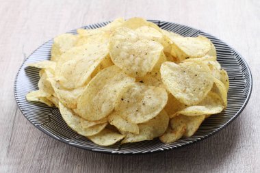 potato chip on a bright background