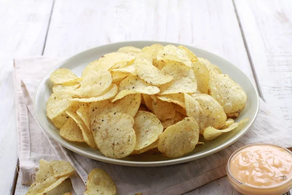 potato chip on a bright background