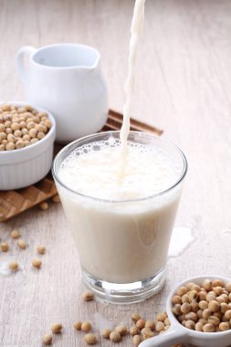 soybean, peanut butter, soy, flax seed on the table.