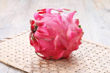 Dragon Fruit, also known as pitaya or pitahaya, is an exotic fruit grown from several different species of cactus indigenous to North, South, and Central America.