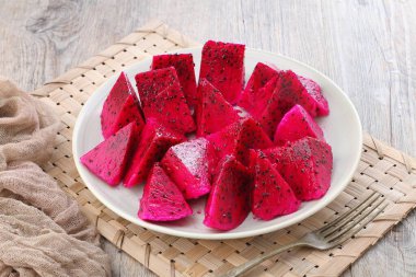 Dragon Fruit, also known as pitaya or pitahaya, is an exotic fruit grown from several different species of cactus indigenous to North, South, and Central America.