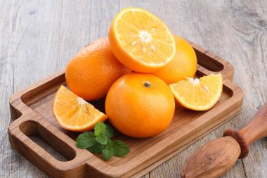 An orange is a fruit of various citrus species in the family Rutaceae, it primarily refers to Citrus  sinensis, which is also called sweet orange, to distinguish it from the related Citrus  aurantium, referred to as bitter orange. 