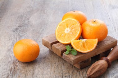 An orange is a fruit of various citrus species in the family Rutaceae, it primarily refers to Citrus  sinensis, which is also called sweet orange, to distinguish it from the related Citrus  aurantium, referred to as bitter orange. 
