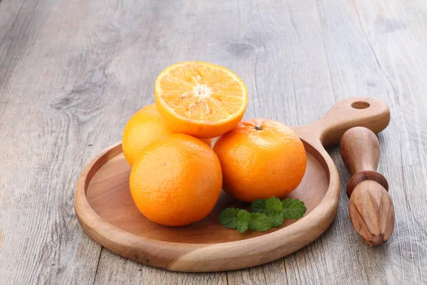 An orange is a fruit of various citrus species in the family Rutaceae, it primarily refers to Citrus  sinensis, which is also called sweet orange, to distinguish it from the related Citrus  aurantium, referred to as bitter orange.