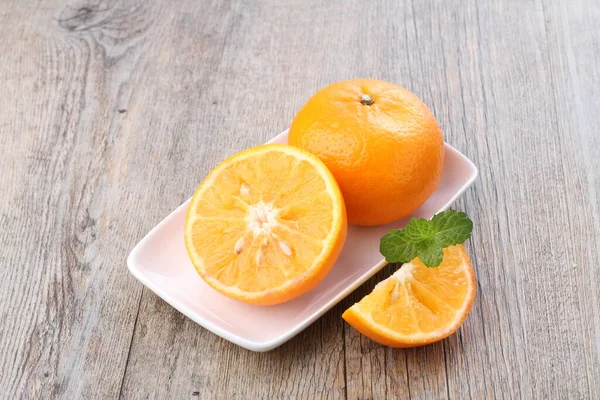 Fresh Orange Fruit Mint White Dish Old Background — Stockfoto