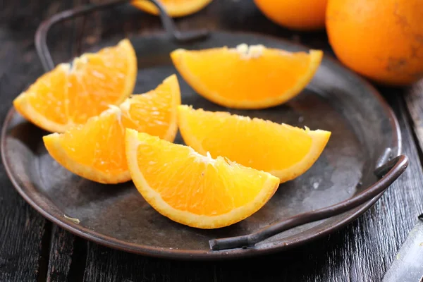 Fresh Ripe Orange Sliced Plate Wooden Table — Stockfoto