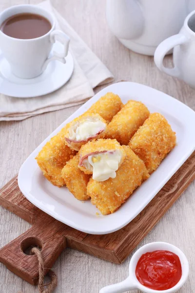 stock image risoles with mayones and cheese