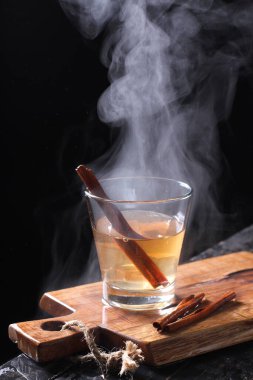 Tea is an aromatic beverage prepared by pouring hot or boiling water over cured or fresh leaves of Camellia sinensis, an evergreen shrub native to East Asia which probably originated in the borderlands of southwestern China and northern Myanmar. 