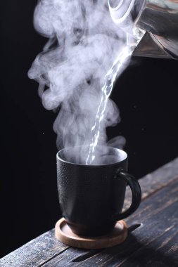 Tea is an aromatic beverage prepared by pouring hot or boiling water over cured or fresh leaves of Camellia sinensis, an evergreen shrub native to East Asia which probably originated in the borderlands of southwestern China and northern Myanmar. 