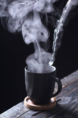 Tea is an aromatic beverage prepared by pouring hot or boiling water over cured or fresh leaves of Camellia sinensis, an evergreen shrub native to East Asia which probably originated in the borderlands of southwestern China and northern Myanmar. 