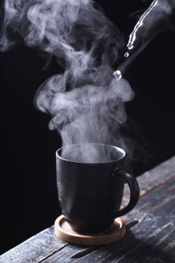 Tea is an aromatic beverage prepared by pouring hot or boiling water over cured or fresh leaves of Camellia sinensis, an evergreen shrub native to East Asia which probably originated in the borderlands of southwestern China and northern Myanmar. 