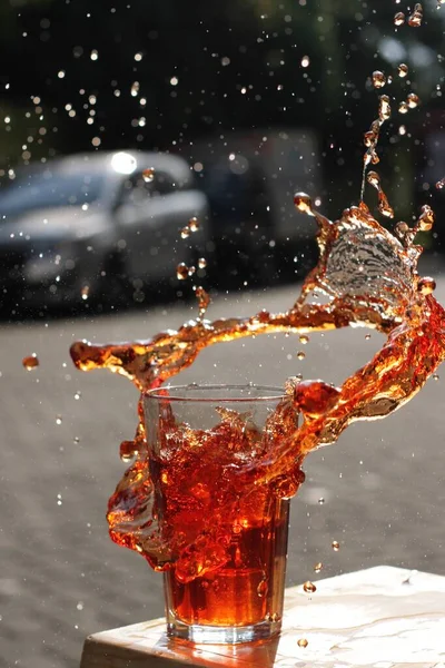 Pouring Cola Ice Cubes Black Background — ストック写真