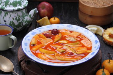 Asinan is a pickled vegetable or fruit dish, commonly found in Indonesia. Asin, Indonesian for 