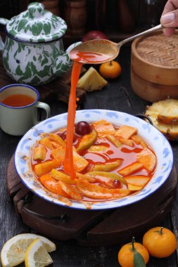 Asinan is a pickled vegetable or fruit dish, commonly found in Indonesia. Asin, Indonesian for 